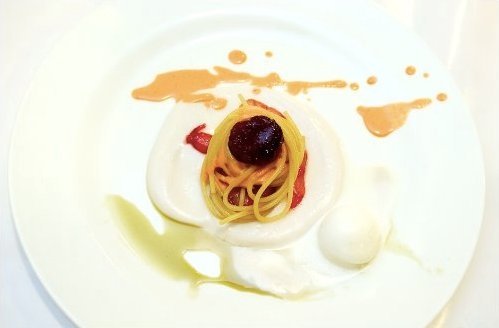 Sweet pasta in almond sea, the first course Corrado Assenza presented at Identità in January 2005 (photo Canio Romaniello)