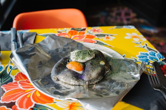 Salted sea urchins, squid ink bread and baked egg yolk (photo credits Eater London)
