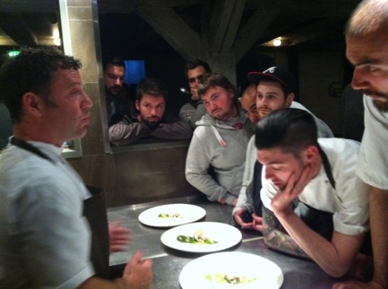 Chef Timothy Magee explaining his dishes to the colleagues at Noma in Copenhagen, Denmark
