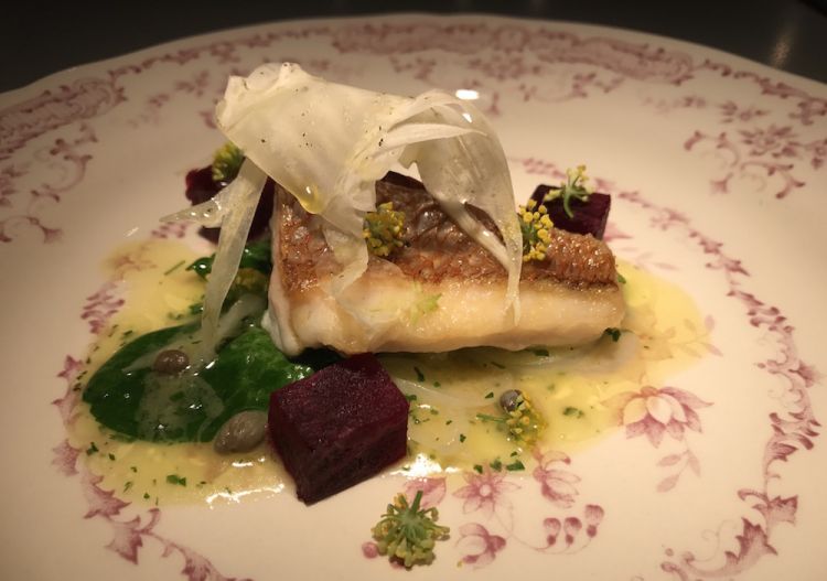 Grilled snapper with spinach, onion, beetroot, fen