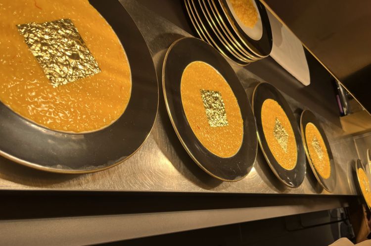 A sequence of Riso oro e zafferano prepared at the Hub of Identità. The dishes were prepared by Osvaldo Presazzi, chef at Terrazza Gualtiero Marchesi inside the Grand Hotel Tremezzo, with his staff
