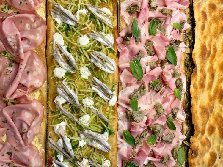 Alcune golose proposte di pizza in teglia al tagli