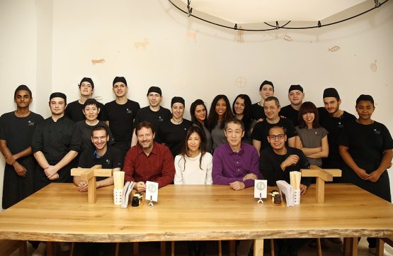 Brendan Becht (the seated man with a beard) with the staff at Zazà Ramen (photo by Matteo Barro)
