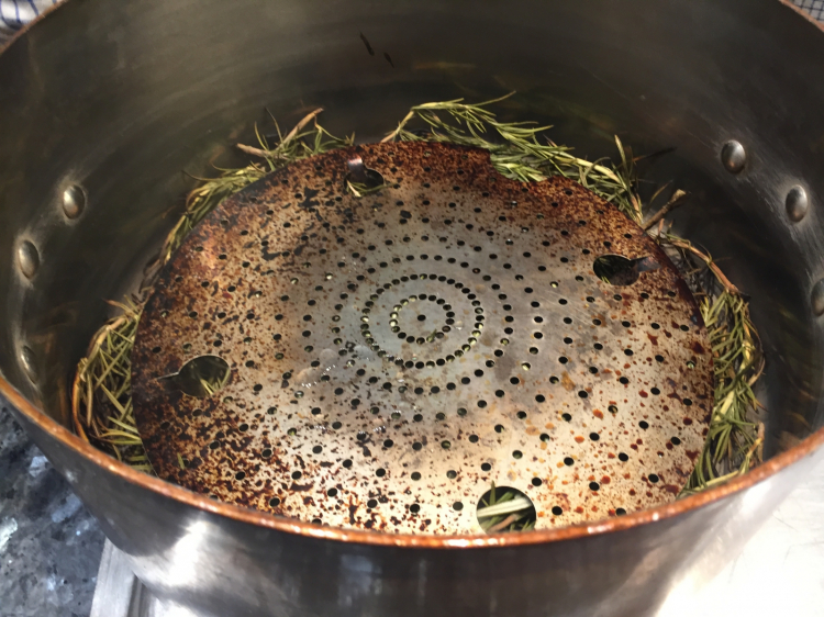 STEP ONE. Put in a copper pot (with a grill) lots of rosemary and light the fire

