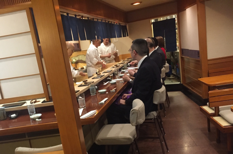 Jiro’s sushi counter. It seats 10 people
