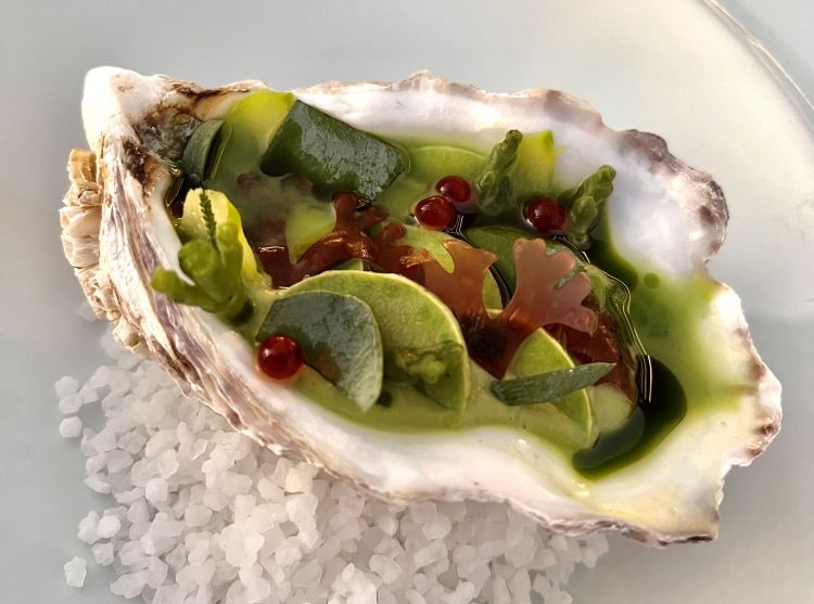 Sea Salad, a highlight of the 2022 menu at Francescana: it includes and emulsion of oysters and clams, broad beans and peas, cucumber water and caviar
