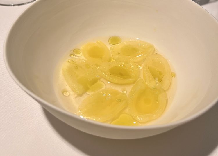 Yellow tomatoes in fennel and liquorice oil. These are the first tomatoes from the Argine's vegetable garden, very young, a preview of a dish on the next menu. It is the taste that has impressed us most, the child of an intuition almost entirely devoid of technical artifice
