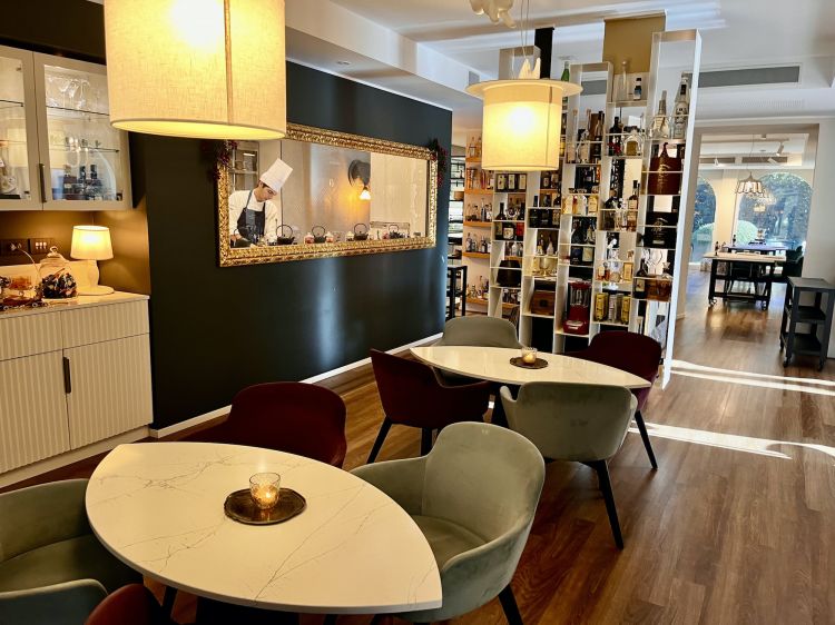 A detail of the dining room. The restaurant, rich in objects and tastefully furnished, 'dedicates 50 per cent of its space to guests and 50 per cent to those who work here', Brunel proudly explains

