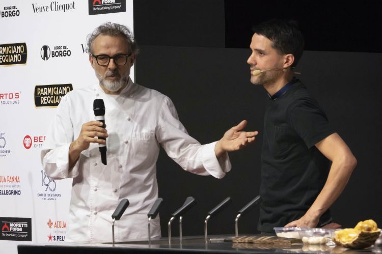 Massimo Bottura, arrived on stage at one point to celebrate his colleague
