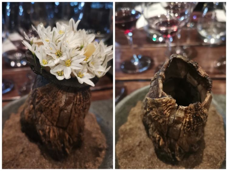 Pulmay affumicato. Questo piatto si compone di due assaggi distinti: una tartina con abulón cileno o loco (Concholepas concholepas: è un mollusco carnivoro che può misurare fino a 15 cm di lunghezza, esclusivo delle acque di Cile e Perù, il suo consumo risale ai primi abitanti precolombiani lungo le coste di entrambi i paesi), purè di fichi e estrella de mar (tradotto letteralmente: stella di mare): un tipo di fiore che si raccoglie solo in questa stagione, lungo le coste di Isla Negra. È una pianta alofita che cresce tra le rocce, profuma di miele, sa di cipolla ed è salata. Poggia sul guscio di un picoroco, un crostaceo che abita le coste del Sud del Cile dal quale si può sorbire il pulmay, un brodo tipico cileno solitamente a base di frutti di mare e carne; in questo caso, nella versione di Guzman, a base di frutti di mare e mele
