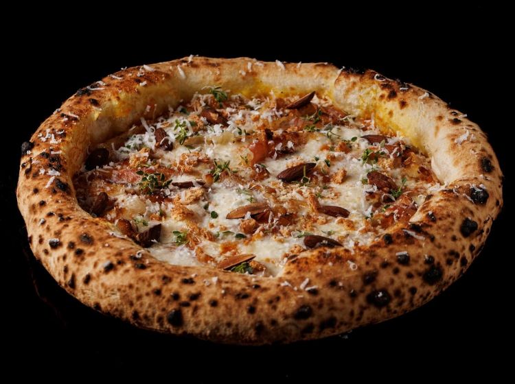 Una delle pizze di stagione, una migliore dell'