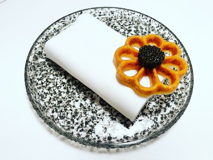 Rose-shaped waffle, Ossetra Royal caviar, Fiord prawns 
