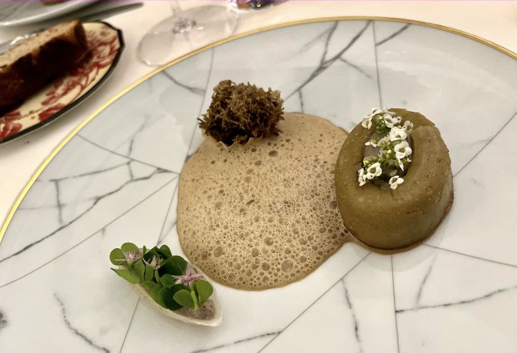 Kroppkaka (traditional Swedish dumpling made with boiled potatoes) filled with Jerusalem artichoke, braised onions and black truffle, a dish from Jerome Calayag, from restaurant Portal in Stockholm, Sweden
