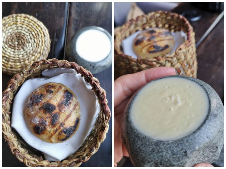 Milcao al rescoldo y mantequilla de pajarito. Ossia: pagnotta milcao cotta al rescoldo accompagnata da un burro di kefir. Milcao è un tipo di pane dell’isola di Chiloé, a base di patate. Il rescoldo è una tecnica di cottura usata da milenni dal popolo mapuche che consiste nel sommergere nella cenere un alimento. Il pajarito è il nome che si usa in Cile per il kefir. Questo burro ottenuto a partire da uno yogurt di kefir - umami, acido, cremoso, delizioso - da spalmare sopra il milcao è una sorta di versione cilena della crème fraîche francese
