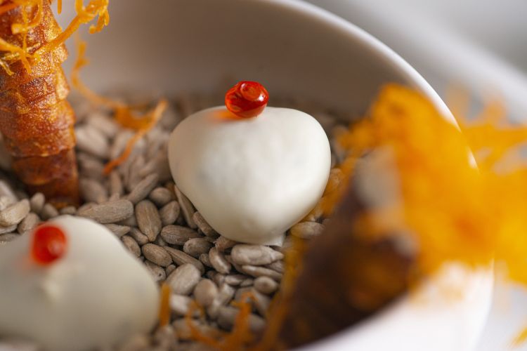 Potato rock and herring caviar and sweet potato cornetto and smoked eel. All photos of the dishes are by Fabrizio Pato Donati