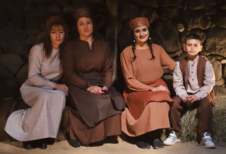 Tsaghkunk, a family dressed traditionally
