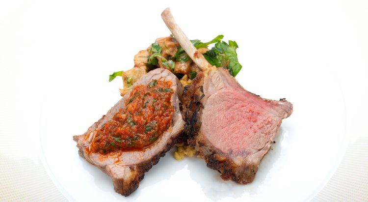 Te Mana roasted lamb with Aleppo chilli pepper, aubergine with mint and cumin relish, harissa, and freekeh green wheat

