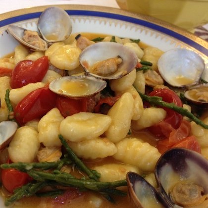 Potato gnocchi with clams, pickle-weed and cherry tomatoes