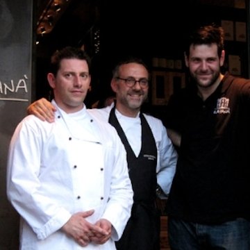 Cesare Battisti at the entrance of Ratanà together with Massimo Bottura and Danilo Ingannamorte, his partner on four different restaurants