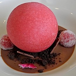 Heinz Beck: An ice sphere with fruits of the forest on a cream of tea with crystallised raspberries