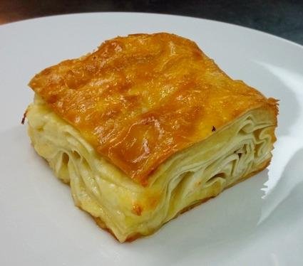 Achma, a kind of khachapuri made with a thin rolled soft egg dough. Doesn't it look like a white lasagna?
