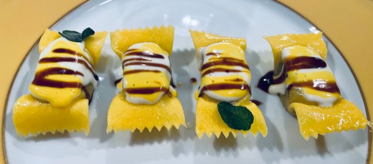 Omaggio a Milano: tortelli farciti di ossobuco di Fassona e midollo nel suo ristretto allo zafferano sardo e parmigiano