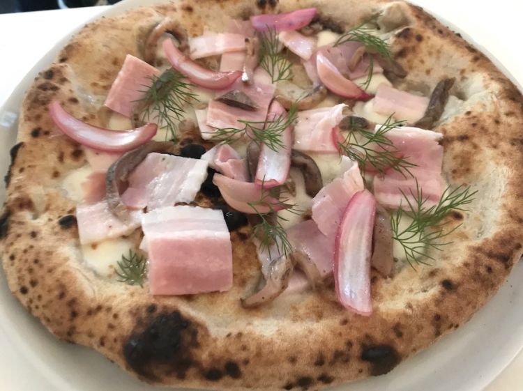 The second of two pizzas prepared by Eugenio Boer: born to a Dutch father, the chef used some typical ingredients from his country 
