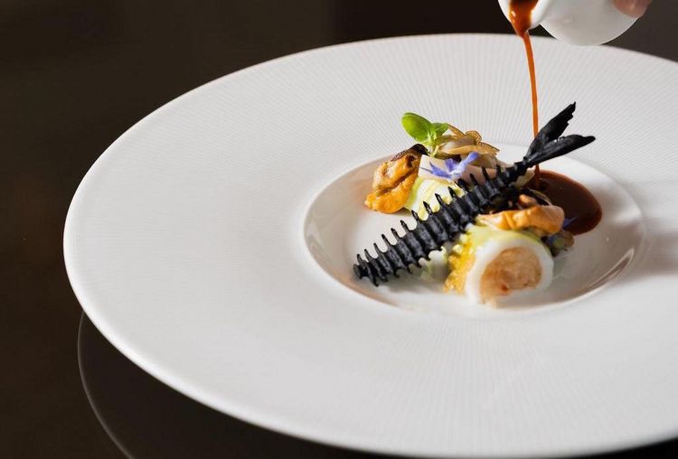 Calamaro e la sua zuppa di pesce