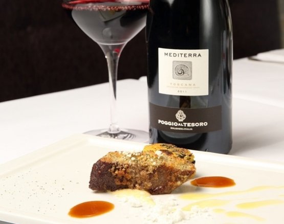 Mediterra IGT Toscana 2011 Poggio al Tesoro was chosen as a pairing with the tasty Lamb loin in garlic and thyme crust with polenta incatenata with black cabbage 
