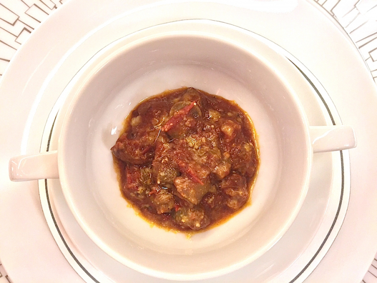 Carlo Cracco’s Snails in tomato sauce presented at his restaurant in Milan. From a recipe from the Sacchi family – Luca Sacchi is the new right arm of the chef from Vicenza
