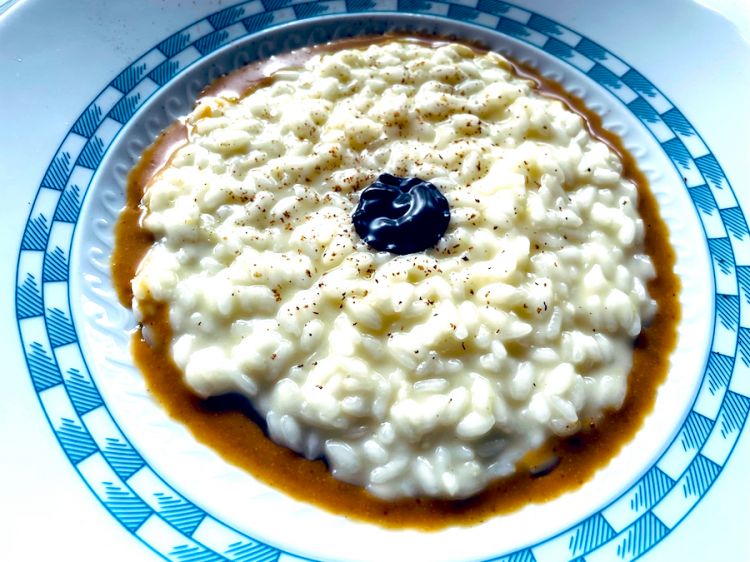 Carlo Cracco's Anchovy and Cinque5 Terre lemon, chocolate and hazelnut risotto on the 15th September at the presentation of the new Lavoratti in Varazze in his restaurant in Portofino