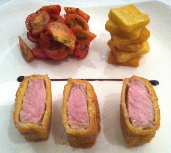 Cubes of Milanese-style veal with corn