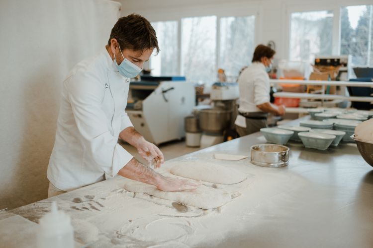 Davide Quaglia (close up) and his brother Massimo in the lab in Sant'Urbano
