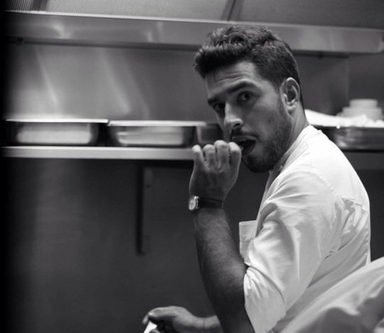 Sardinian chef Simone Tondo, 26, in the kitchen of