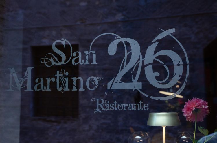 L'insegna del ristorante San Martino 26, un in