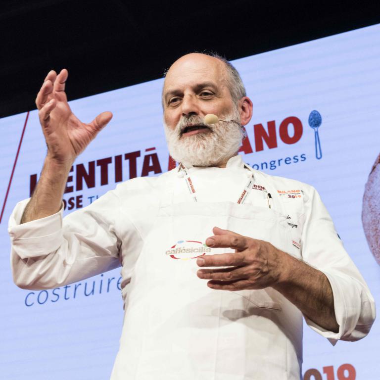 Corrado Assenza on the stage of the auditorium
