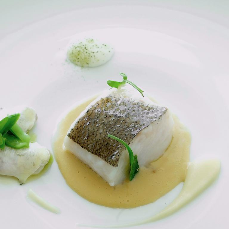 Cod, its kokotxas, sauce meuniere, French beans and sorrel. Kokotxas is the underpart of the cod’s jaws, a mostly Basque specialty 
