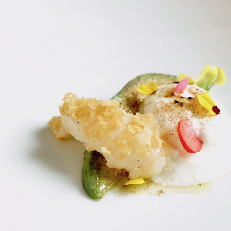 Amande: roasted scampi with rhododendron honey, avocado with cinnamon, mousse of apricot kernels, powdered coffee 
