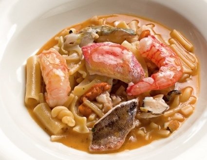 Mixed pasta soup with small rockfish and crustaceans  