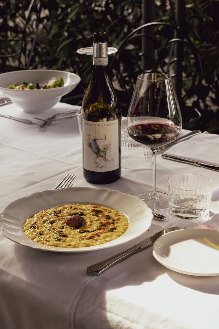 Riso Carnaroli Tenuta Margherita ai pistilli di zafferano, burro acido, grana Lodigiano Caseificio Zucchelli, gremol&agrave;, midollo di vitello e la sua demi glace
