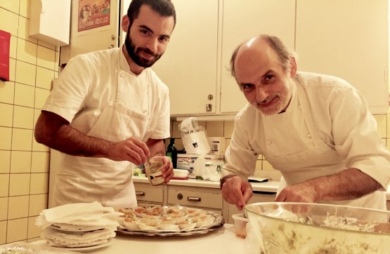 With his son Francesco, preparing some small tastings of Peaches in syrup with durum wheat cuturro with pistachios from Bronte and orange marmalade at the Italian Institute of Culture 
