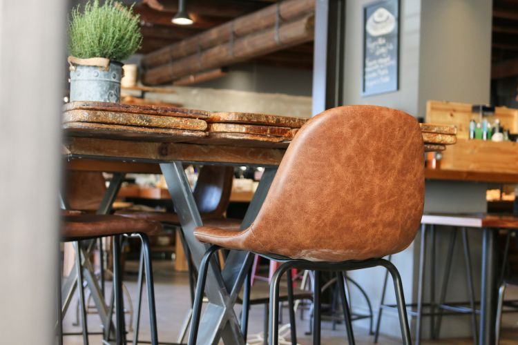 The large table created with old wood boards 
