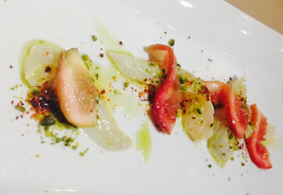The Raw dourade marinated in pistachio oil and lemon, with chopped pistachios and marinated figs by April Bloomfield