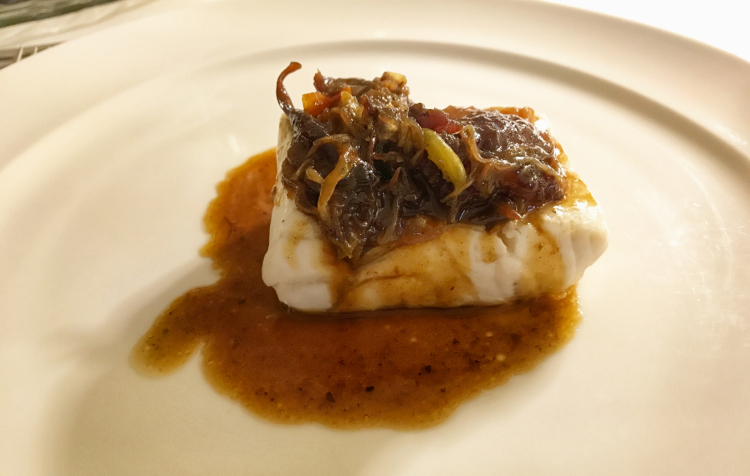 Branzino e coda di bue: uno dei primissimi piatti di Baronetto al Del Cambio, che tuttora resta un esempio mirabile di equilibrio