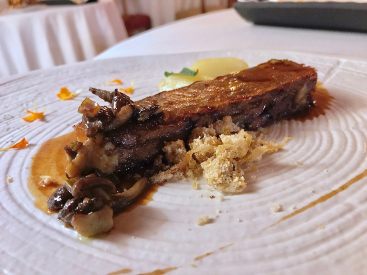 Oxtail terrine, celery sauce, baby potato crumble