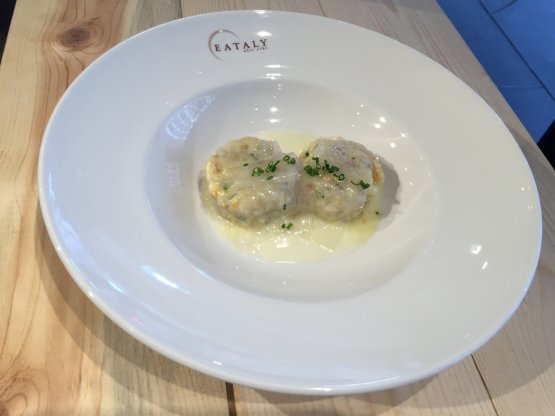 Gnocchi made with bread and prosciutto with squash and cream of Grana Padano Riserva by Michael White
