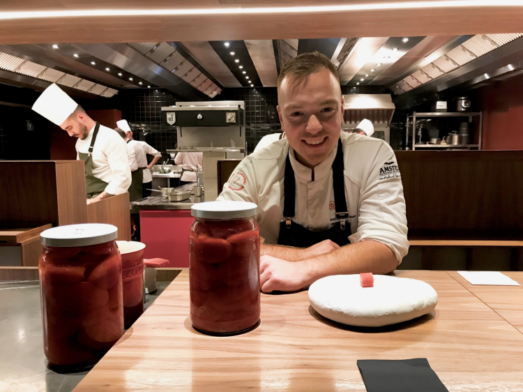 Not preserves, but a semi-preserve: they boil the tomatoes in a vacuum jar for 8 minutes only, then put them into a solution with calcium which preserves texture and aromas. In the picture, some of the jars, with sous chef Jeffrey Van Zijl
