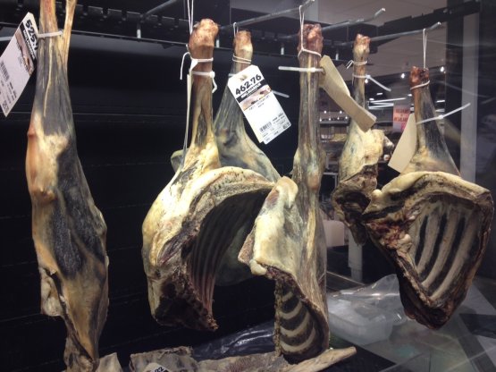 Sheep thighs hanging in a supermarket in Torshavn,