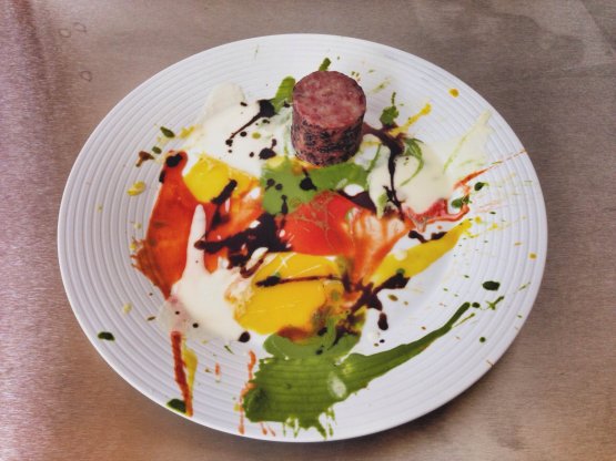 Beautiful Sonic Disco of Love and Hate at the Gate of Hell Painting with Wicked Pools of Glorious Color and Psychedelic Spin-painted Cotechino, not Flame Grilled: this dish was born thanks to the friendship between Massimo Bottura and British artist Damien Hirst 
