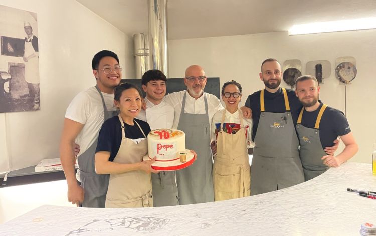 Group photo with part of the Pepe In Grani brigade. On the left, holding the celebratory 'cake' of Authenitca 10, Elizabeth Hong, executive chef of Osteria Mozza